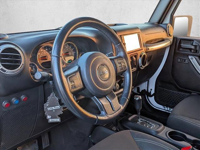 used 2017 Jeep Wrangler Unlimited car, priced at $18,836