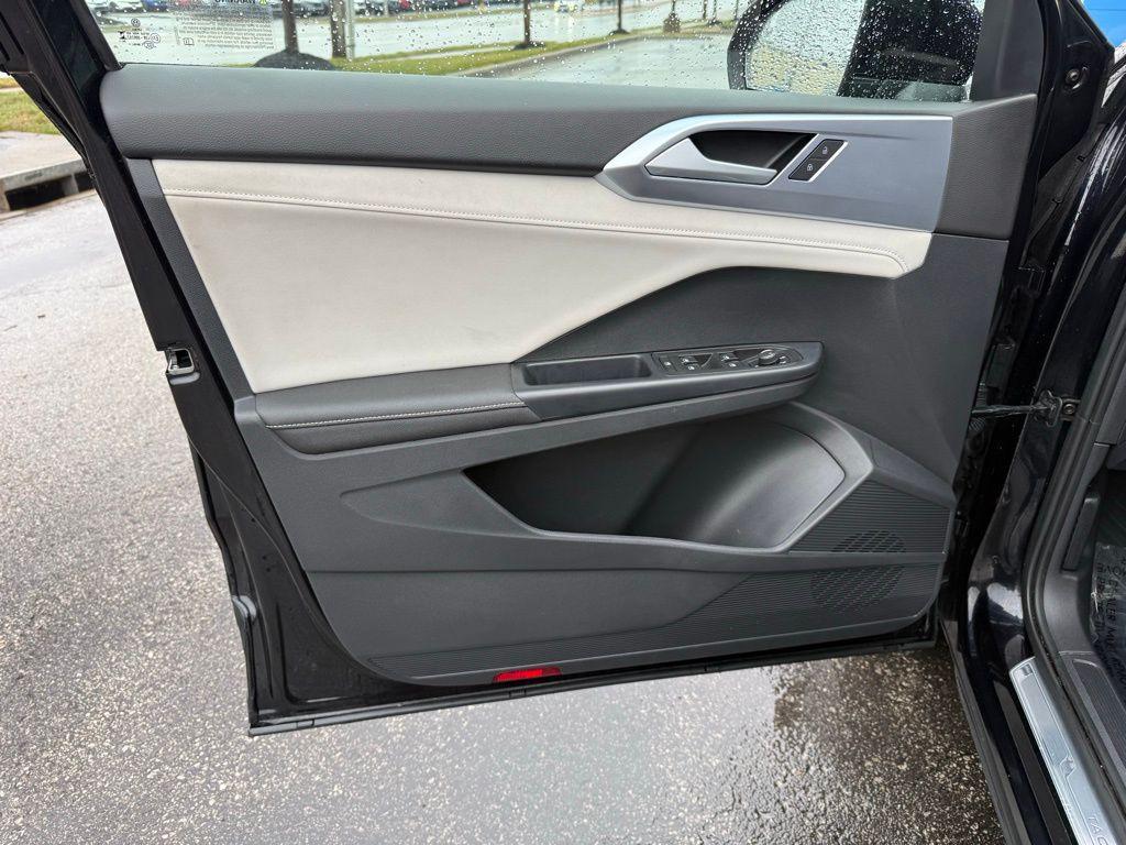 used 2025 Volkswagen Taos car, priced at $22,500