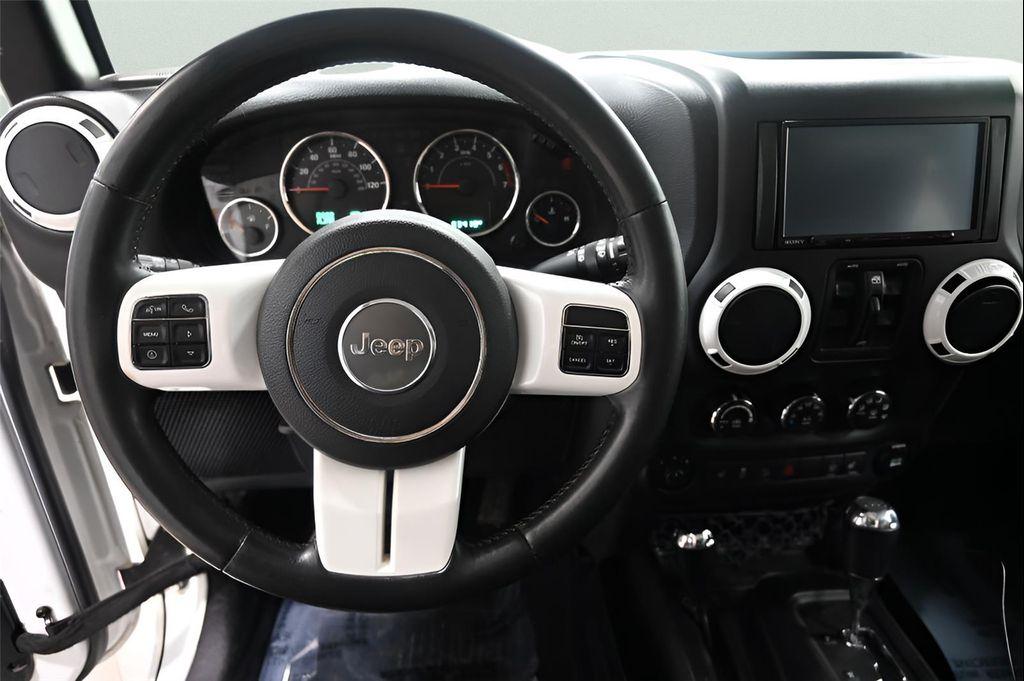 used 2015 Jeep Wrangler Unlimited car, priced at $18,992
