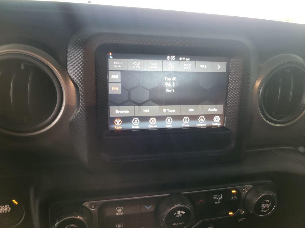 used 2023 Jeep Wrangler car, priced at $31,195