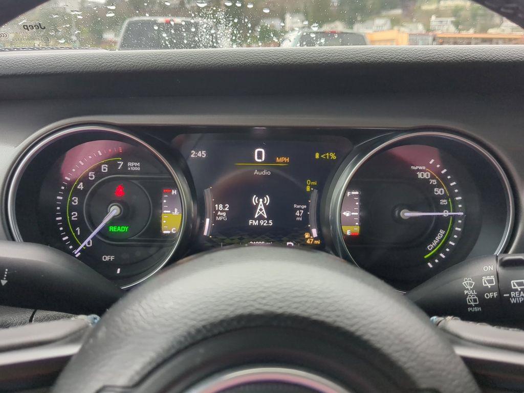 used 2023 Jeep Wrangler 4xe car, priced at $28,181