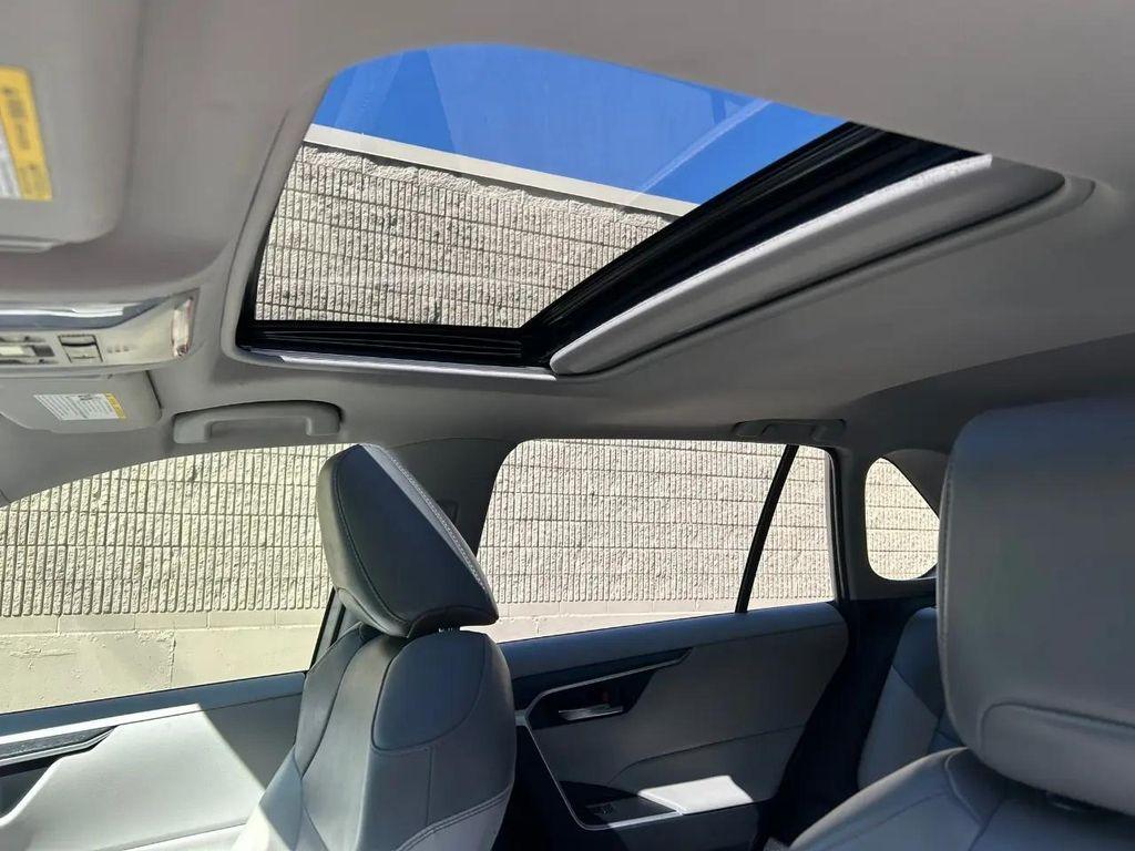 used 2021 Toyota RAV4 Hybrid car, priced at $27,995