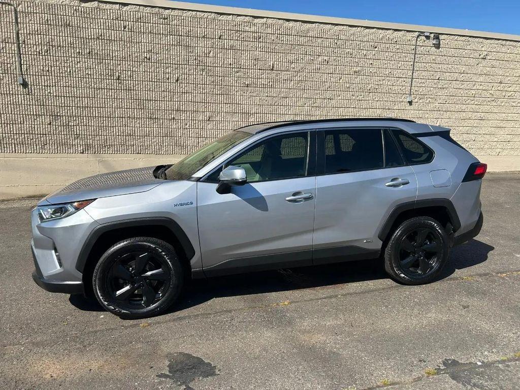 used 2021 Toyota RAV4 Hybrid car, priced at $27,995