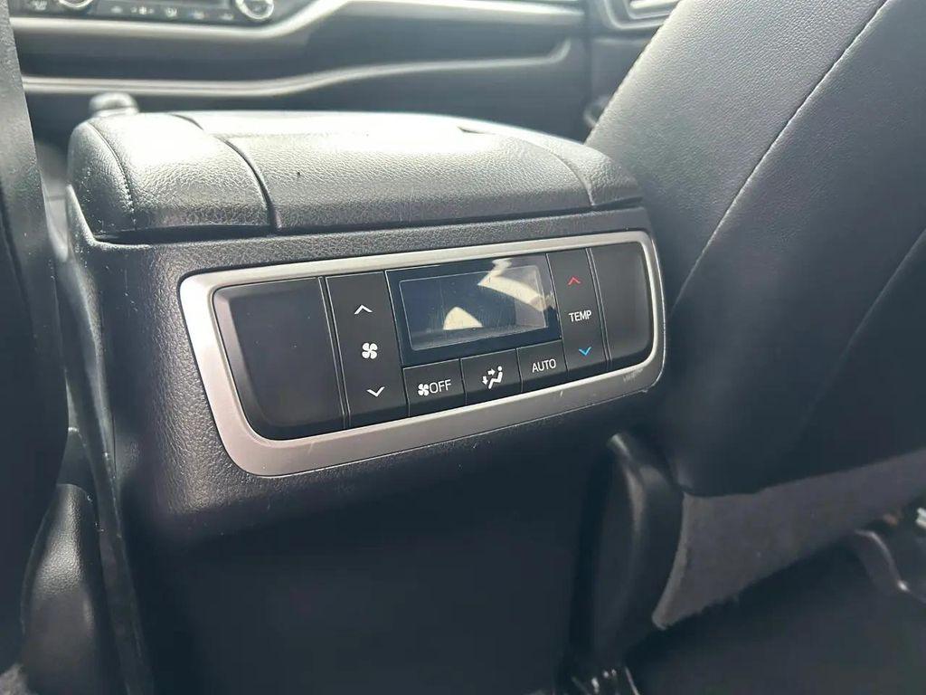 used 2019 Toyota Highlander Hybrid car, priced at $23,995