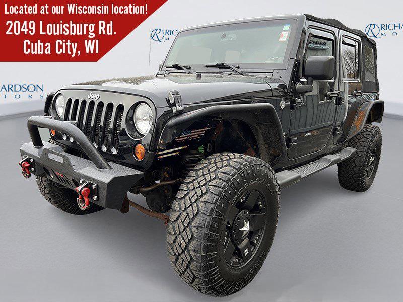used 2013 Jeep Wrangler Unlimited car, priced at $9,669