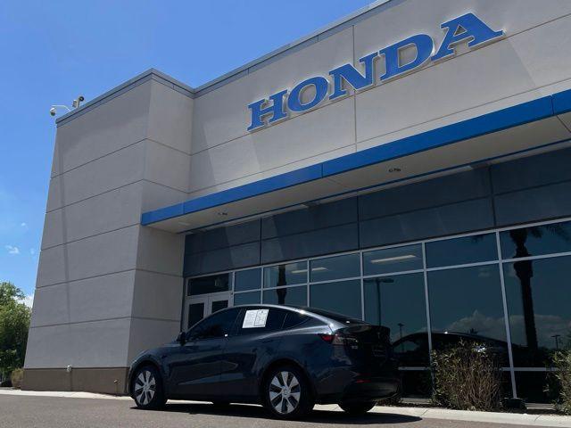 used 2024 Tesla Model Y car, priced at $27,935