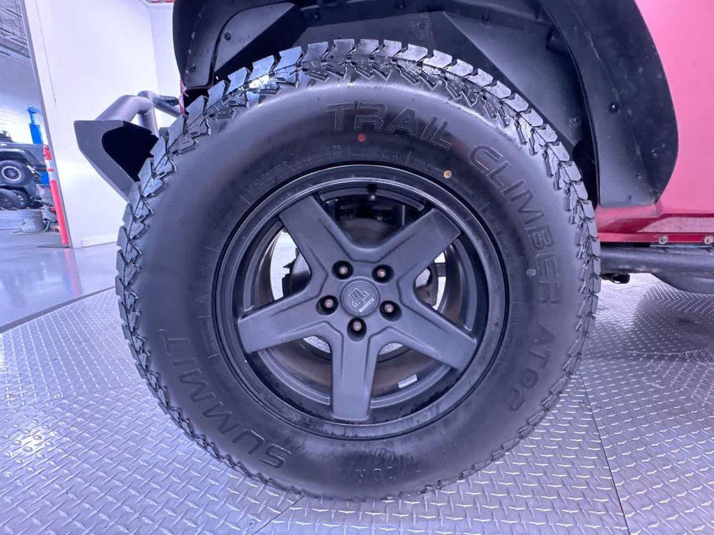 used 2013 Jeep Wrangler Unlimited car, priced at $16,224