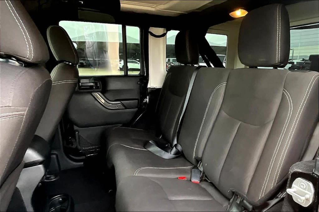 used 2018 Jeep Wrangler JK Unlimited car, priced at $24,998