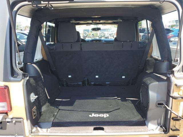 used 2014 Jeep Wrangler Unlimited car, priced at $13,394