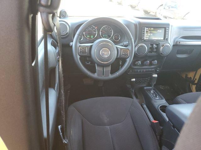 used 2014 Jeep Wrangler Unlimited car, priced at $13,394