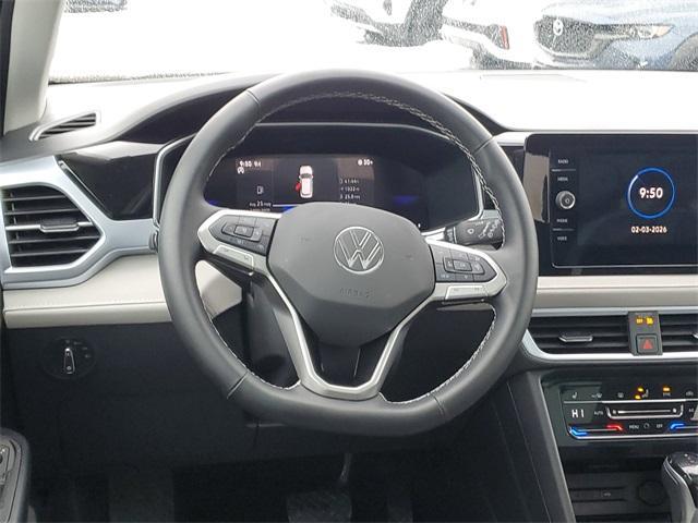 used 2025 Volkswagen Taos car, priced at $27,895