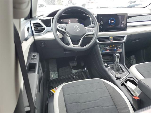 used 2025 Volkswagen Taos car, priced at $27,895