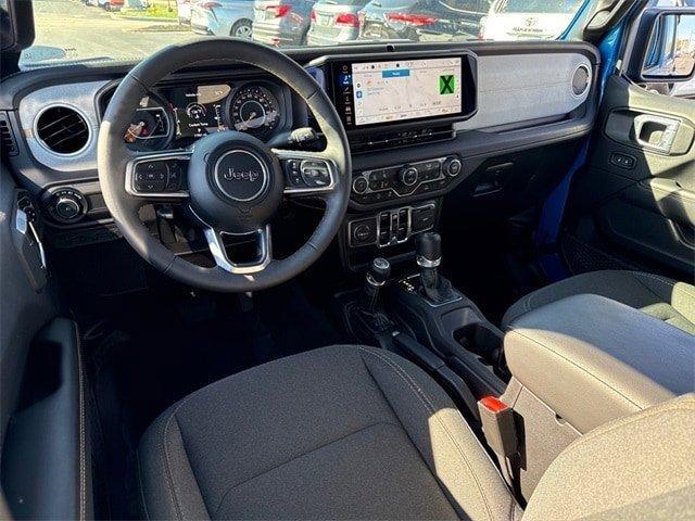 used 2024 Jeep Wrangler car, priced at $35,225
