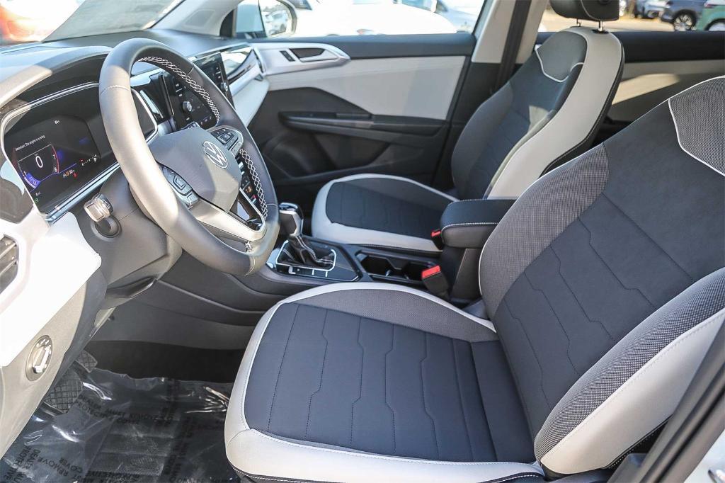 new 2025 Volkswagen Taos car, priced at $26,033