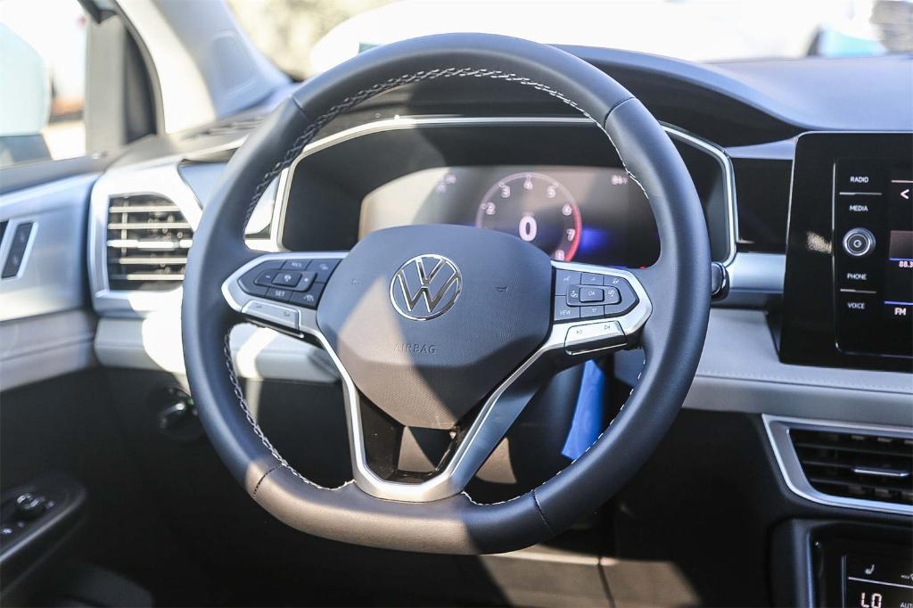 new 2025 Volkswagen Taos car, priced at $26,033