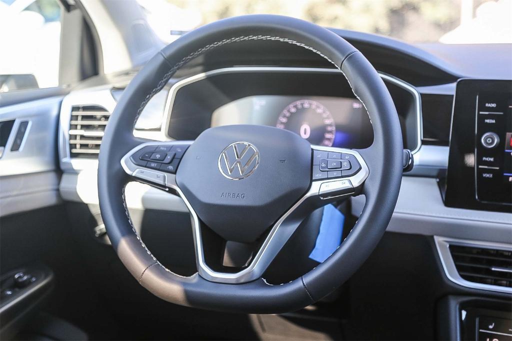 new 2025 Volkswagen Taos car, priced at $26,895