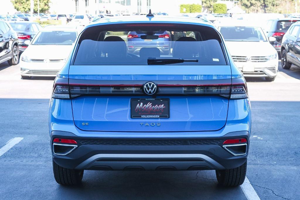 used 2025 Volkswagen Taos car, priced at $25,174