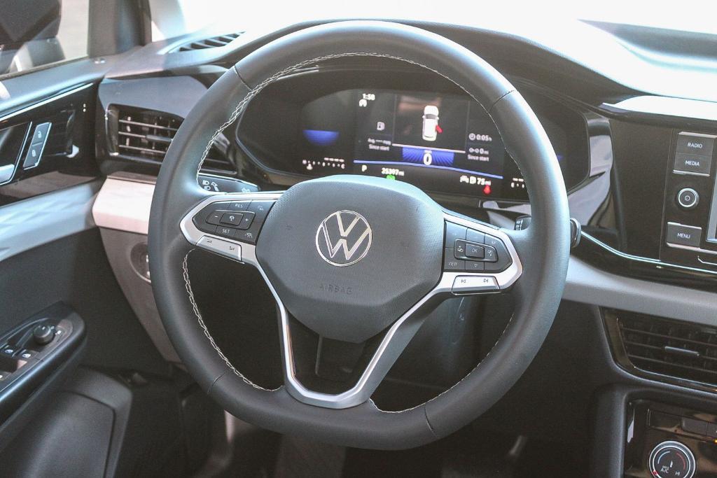 used 2024 Volkswagen Taos car, priced at $18,999