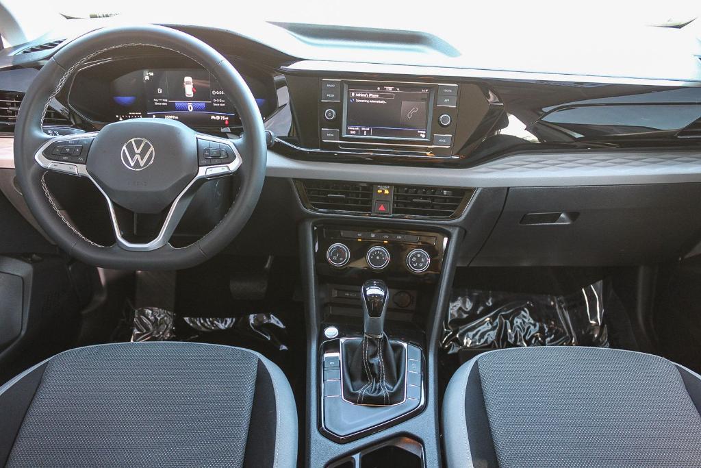 used 2024 Volkswagen Taos car, priced at $18,999