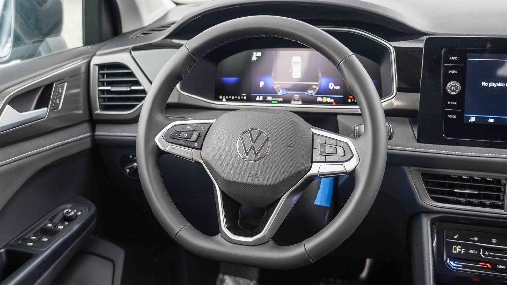 new 2025 Volkswagen Taos car, priced at $28,400