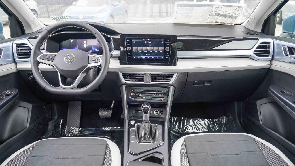 new 2025 Volkswagen Taos car, priced at $27,290