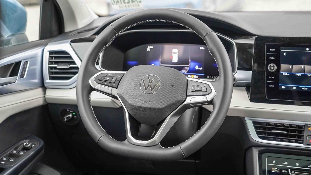 new 2025 Volkswagen Taos car, priced at $27,290