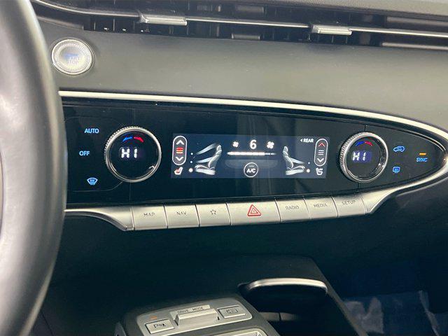 used 2023 Genesis GV70 car, priced at $39,317