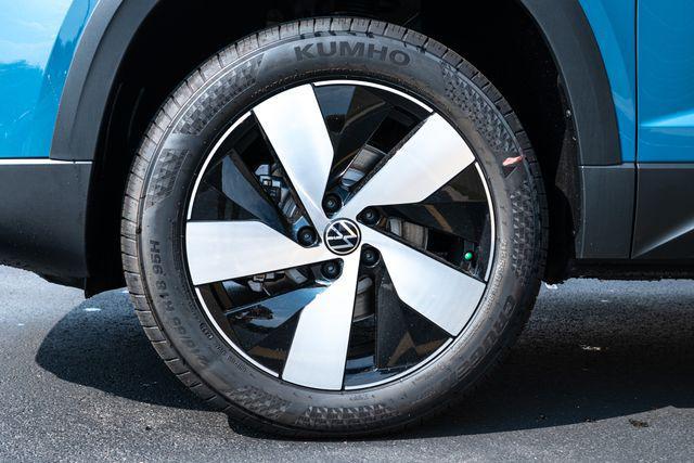 new 2025 Volkswagen Taos car, priced at $29,221