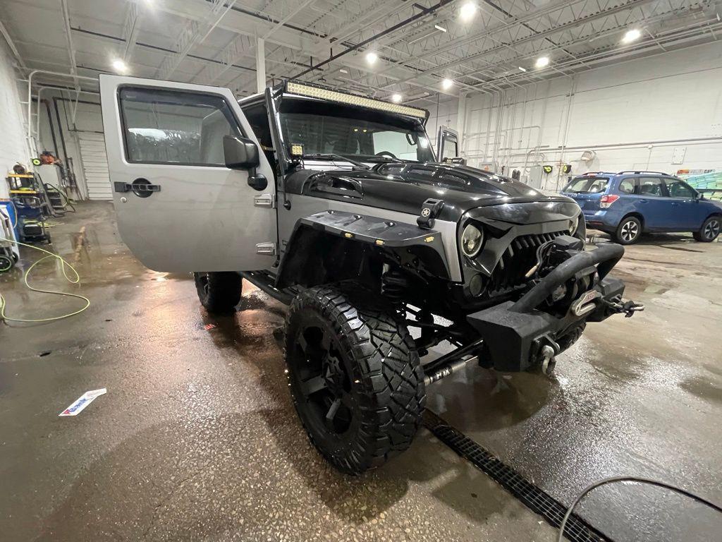 used 2015 Jeep Wrangler car, priced at $16,999