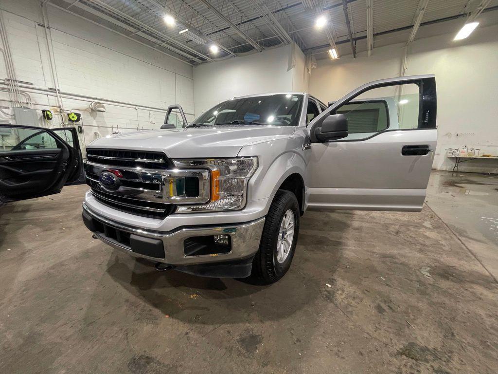 used 2018 Ford F-150 car, priced at $25,273