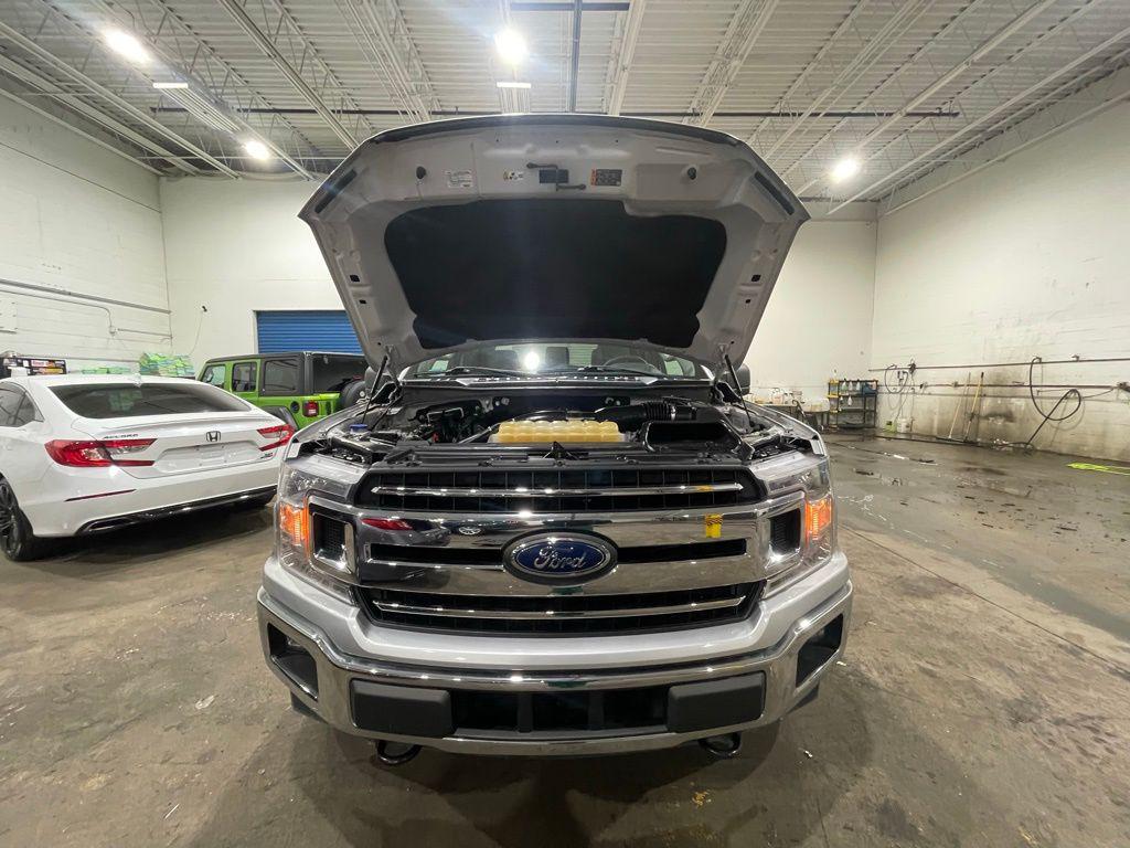 used 2018 Ford F-150 car, priced at $25,273