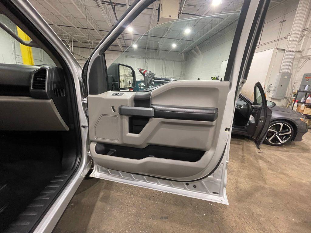 used 2018 Ford F-150 car, priced at $25,273