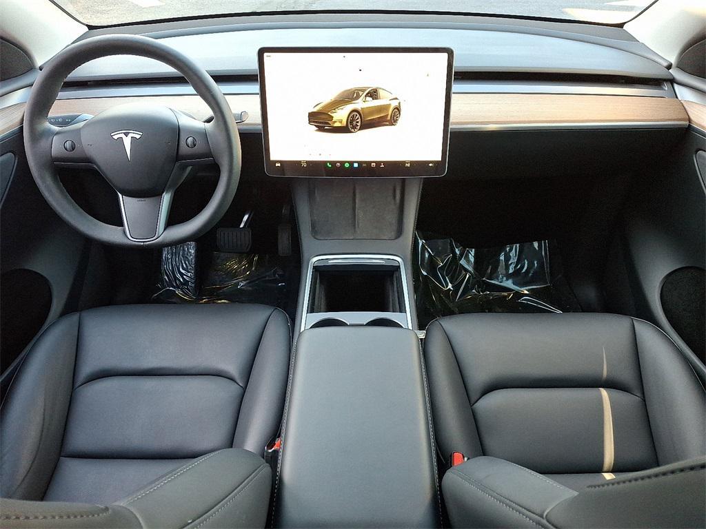 used 2025 Tesla Model Y car, priced at $36,095