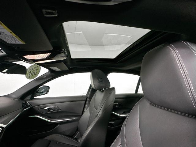 used 2024 BMW 330e car, priced at $32,000