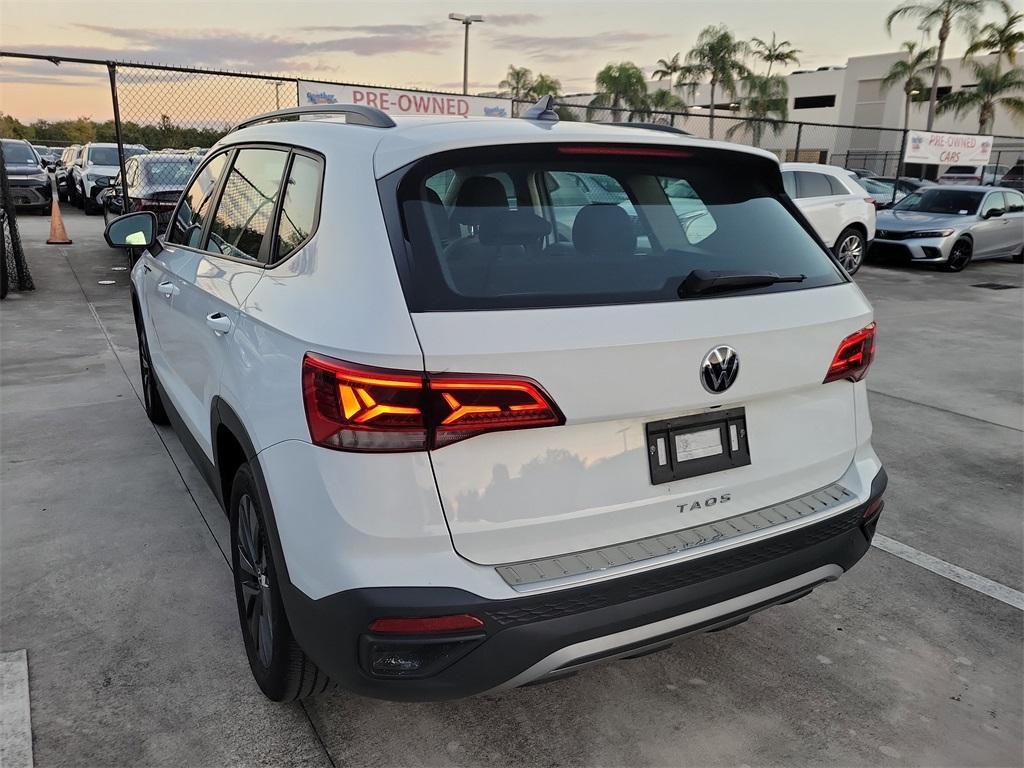 used 2023 Volkswagen Taos car, priced at $16,698