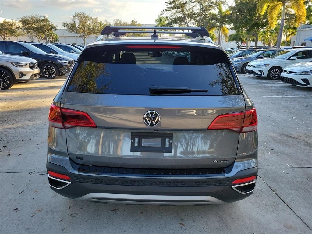 used 2024 Volkswagen Taos car, priced at $21,898