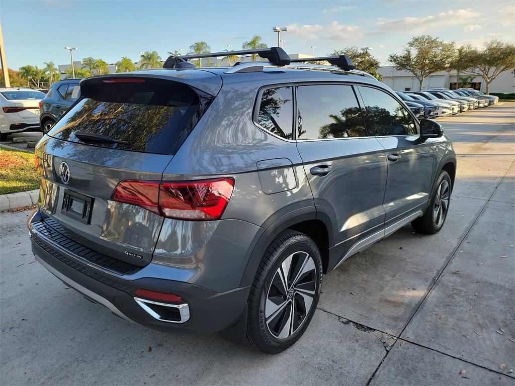 used 2024 Volkswagen Taos car, priced at $21,898