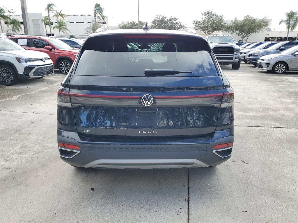 used 2025 Volkswagen Taos car, priced at $21,998