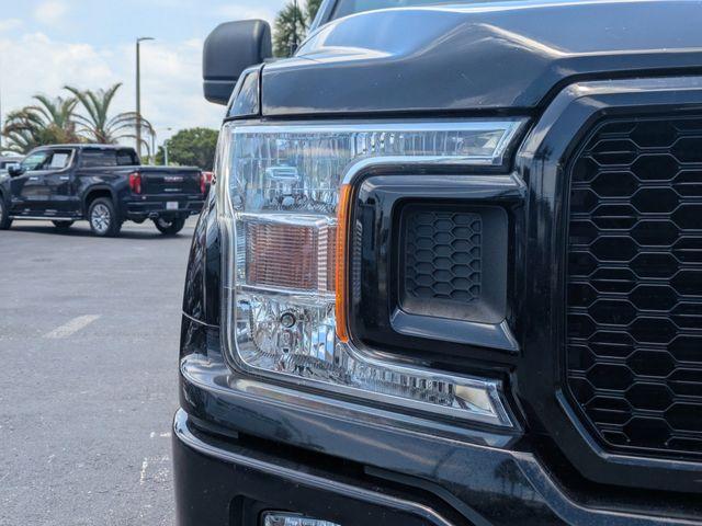 used 2018 Ford F-150 car, priced at $22,542