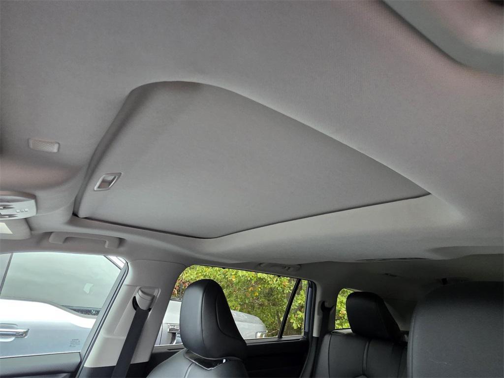 used 2021 Toyota Highlander Hybrid car, priced at $28,413