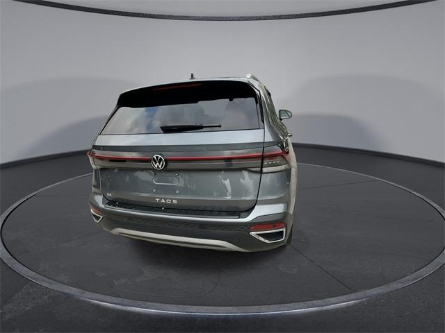 used 2025 Volkswagen Taos car, priced at $23,784