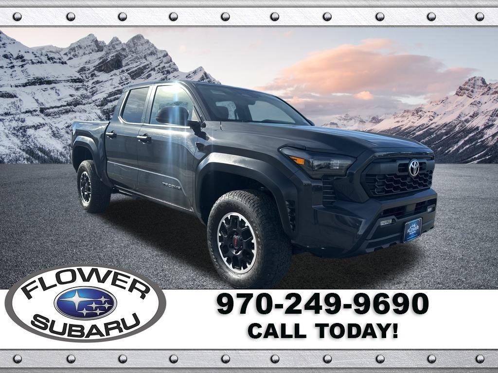 used 2024 Toyota Tacoma car, priced at $45,596