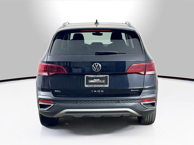 used 2023 Volkswagen Taos car, priced at $24,436
