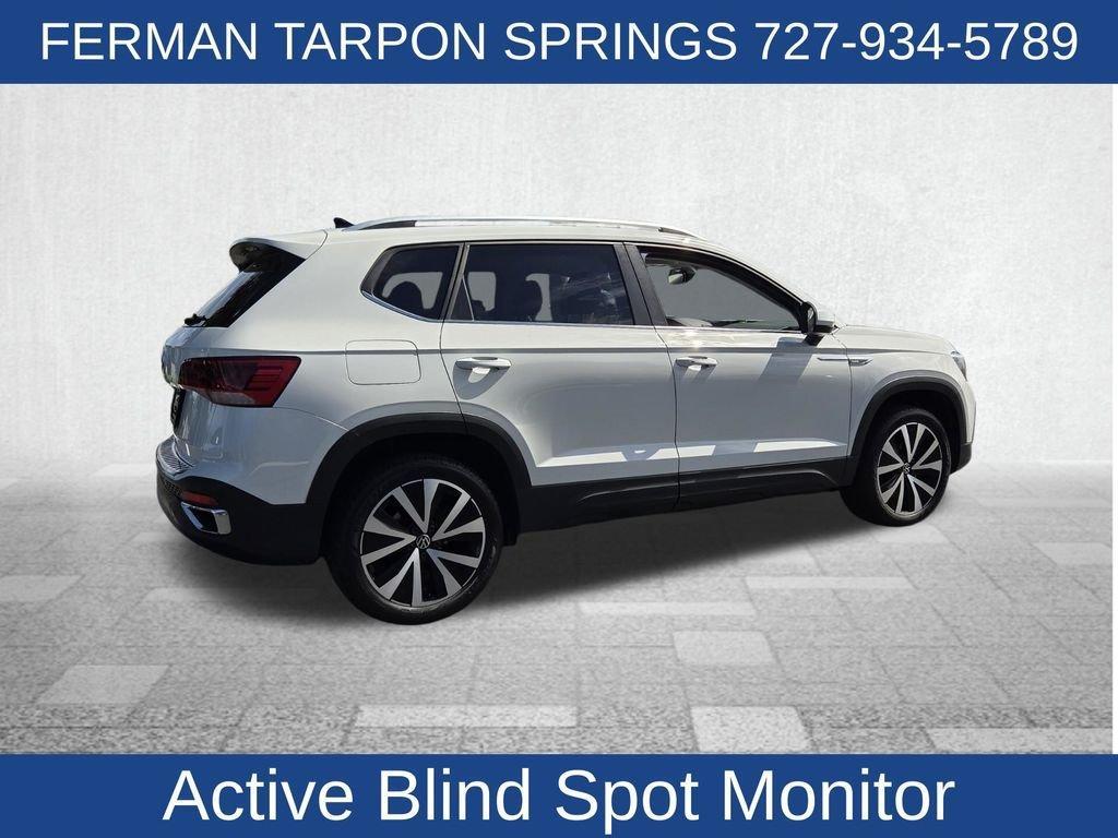 used 2024 Volkswagen Taos car, priced at $23,050