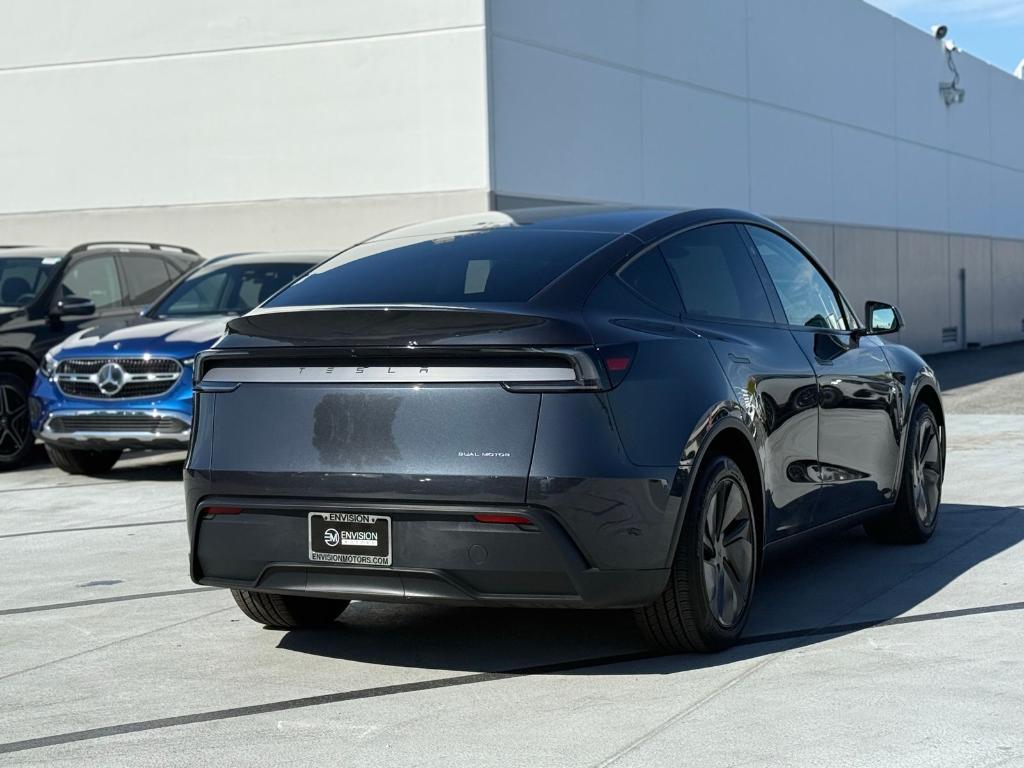 used 2026 Tesla Model Y car, priced at $47,946