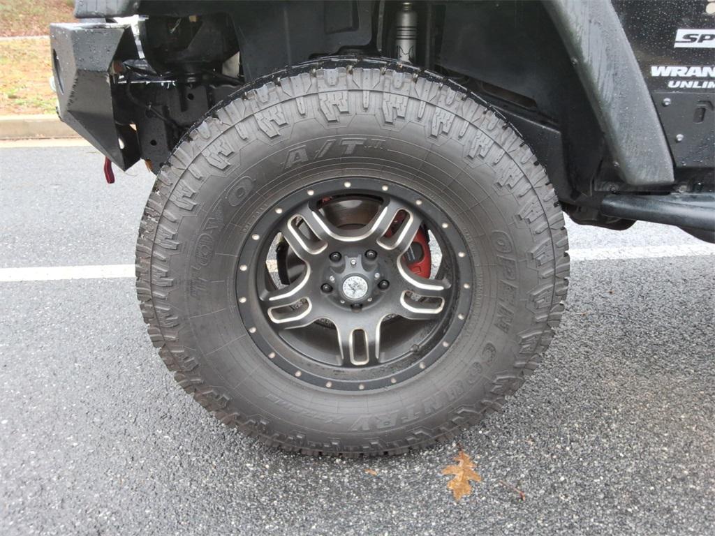 used 2015 Jeep Wrangler Unlimited car, priced at $18,125