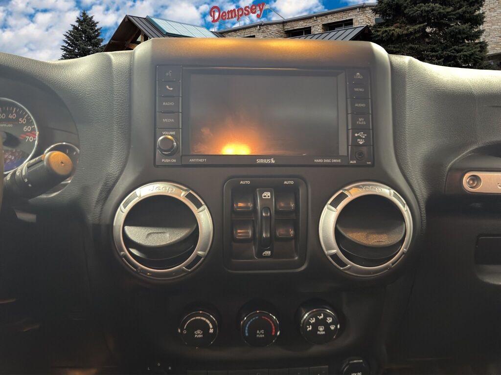 used 2016 Jeep Wrangler Unlimited car, priced at $23,991