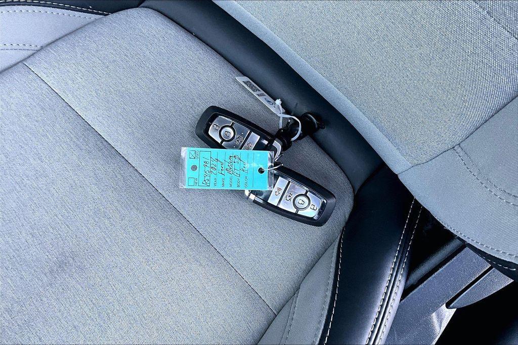 used 2024 Ford Mustang car, priced at $39,297