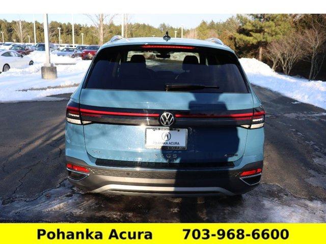 used 2025 Volkswagen Taos car, priced at $29,597