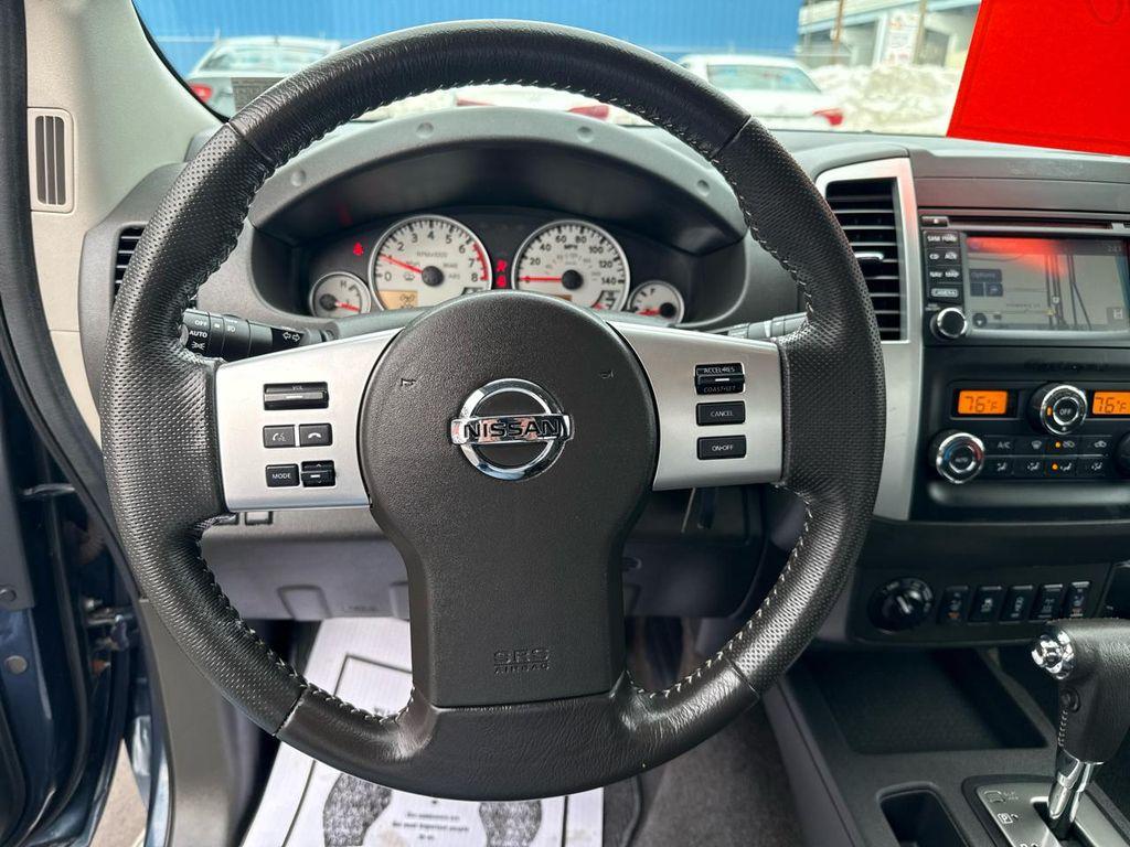 used 2015 Nissan Frontier car, priced at $19,900